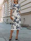 Elegancka sukienka midi z krótkim rękawem w botaniczny wzór
