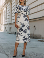 Elegancka sukienka midi z krótkim rękawem w botaniczny wzór