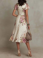 Elegancka vintage sukienka midi w kwiaty z satyny