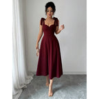 Livia – elegancka sukienka maxi z dekoltem karo