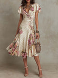 Elegancka vintage sukienka midi w kwiaty z satyny
