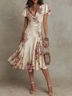 Elegancka vintage sukienka midi w kwiaty z satyny